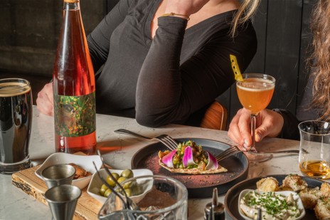 Head back home for cocktails, local brews, and a soak in the hot tub